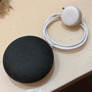 Google home mini. Dark grey. With cable. Everything works great. New (no box)